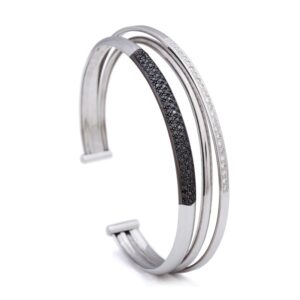 Brazalete de oro blanco con diamantes y diamantes negros