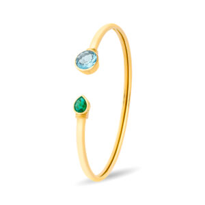 Brazalete de oro amarillo, topacio azul y esmeralda