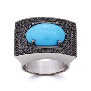 Anillo de oro blanco con turquesa y diamantes negros